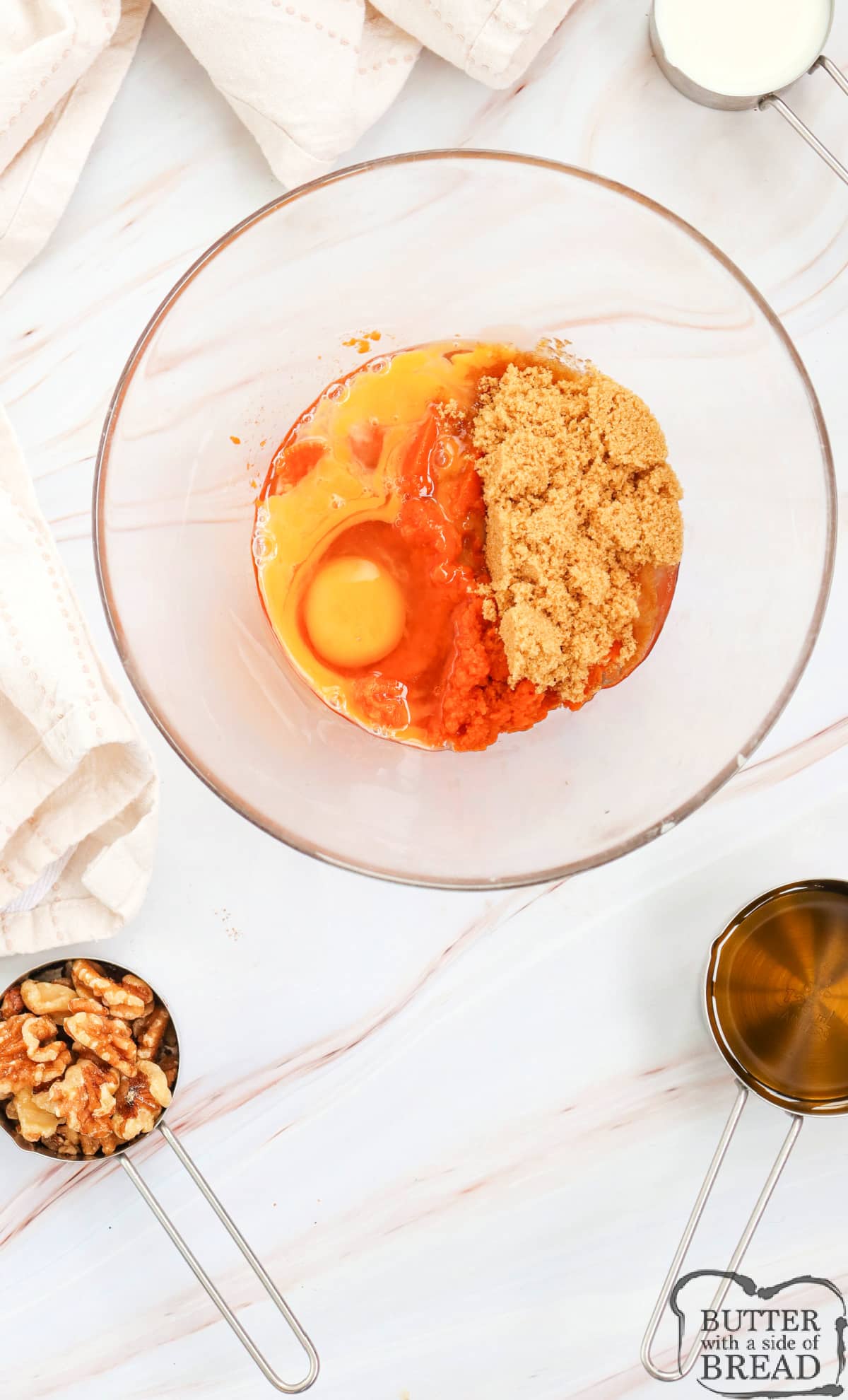Mix the pumpkin puree, brown sugar, oil, vanilla extract, milk, and eggs in a separate bowl until well combined.