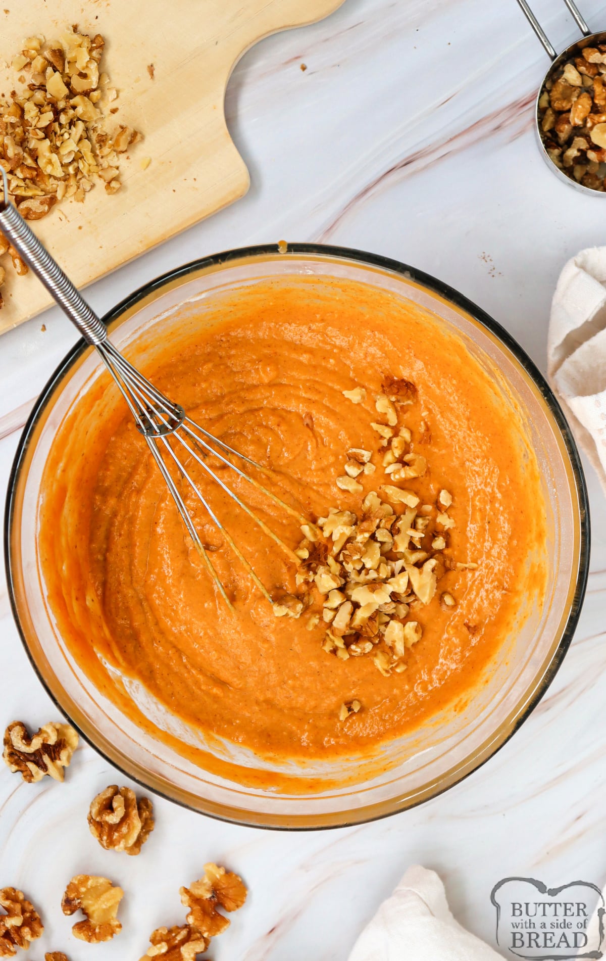 Add chopped walnuts to muffin batter.