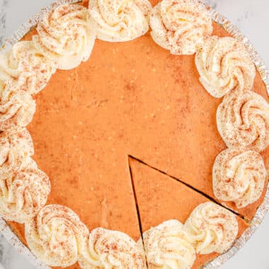 easy no bake pumpkin pie with a slice cut out
