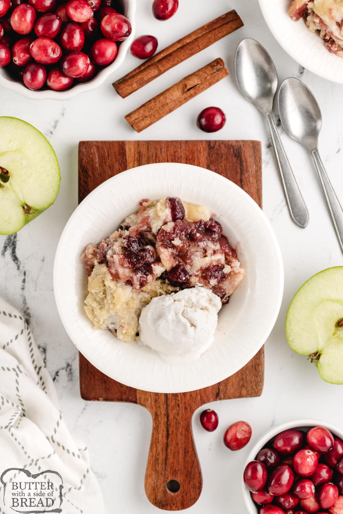 Apple cobbler made with cranberries and a sugar cookie crust.