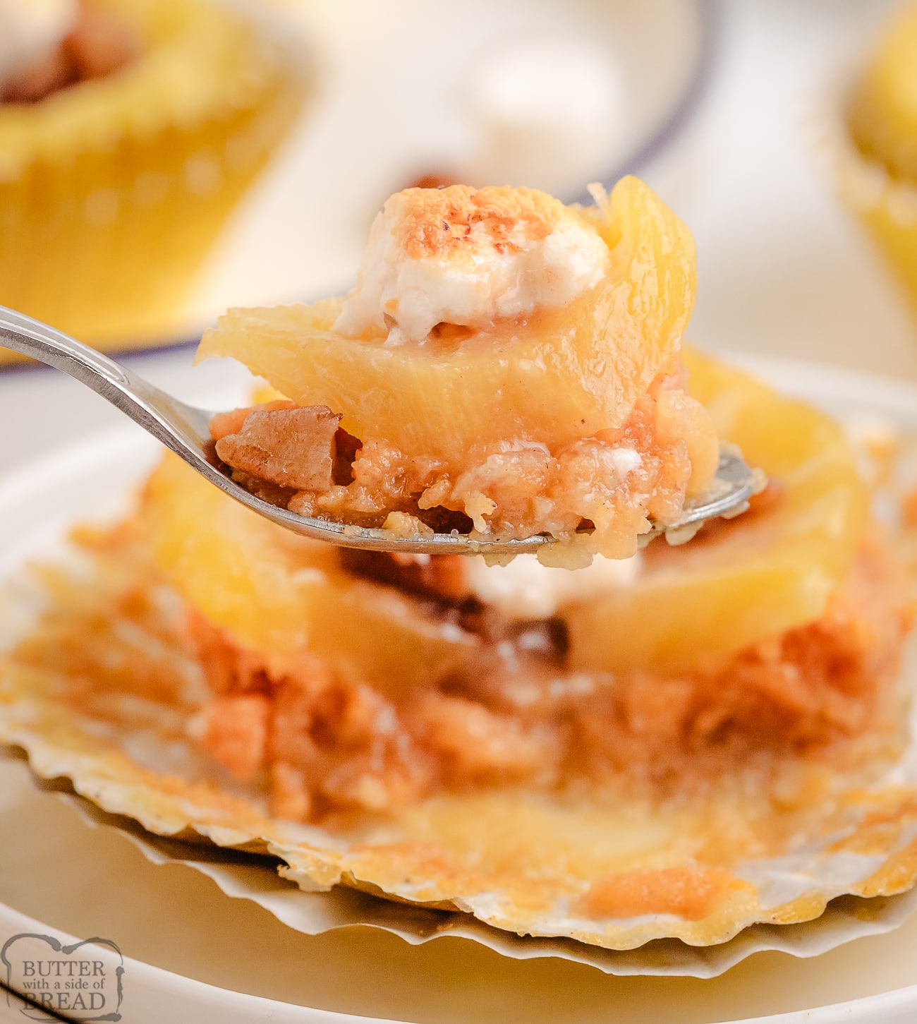 taking a bite out of pineapple sweet potato cups