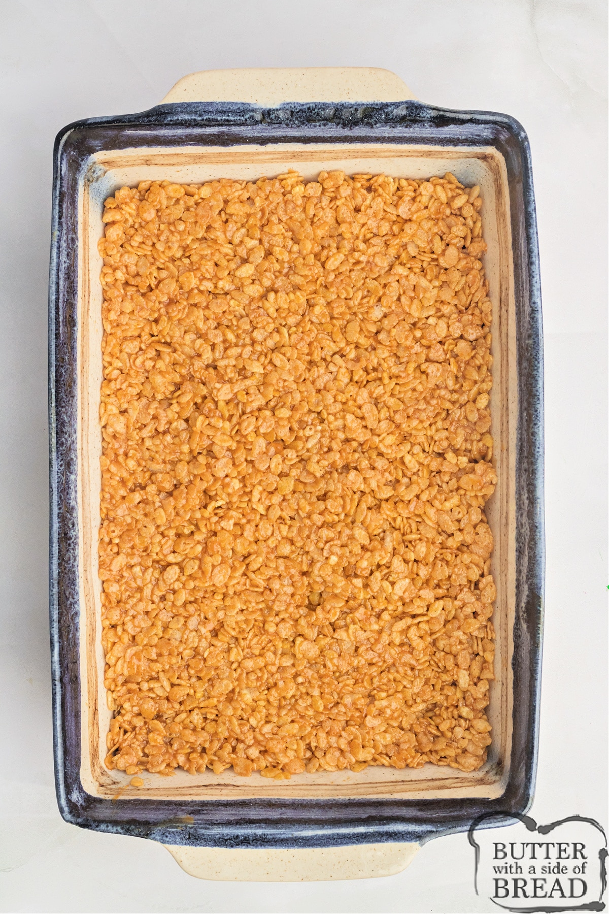 Spread rice krispie treats in prepared pan. 