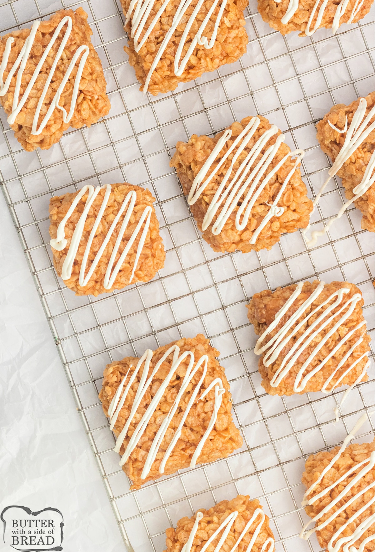 Drizzle white chocolate on top of rice krispie treats.