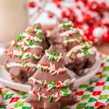 3 stacked Chocolate Christmas tree cakes on a plate