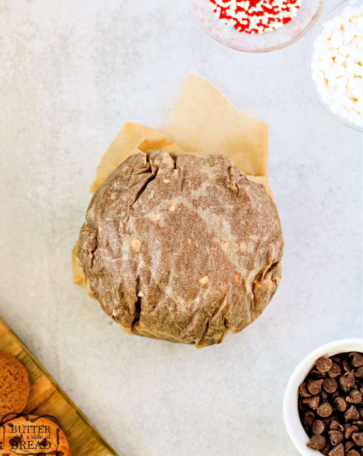 Cheeseball wrapped in parchment paper.