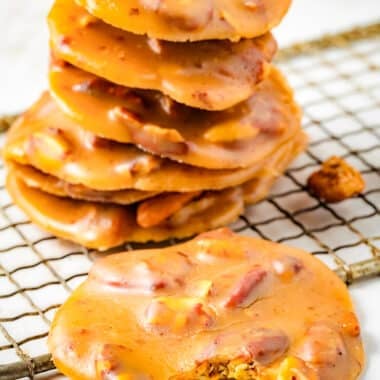stack of pecan pralines on a cooling rack