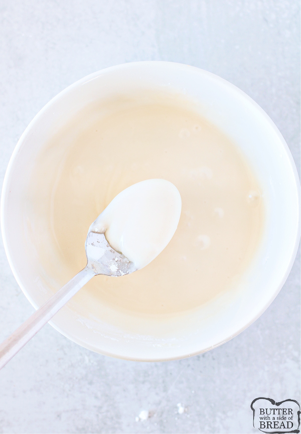 Making a sugar cookie glaze for the waffles.