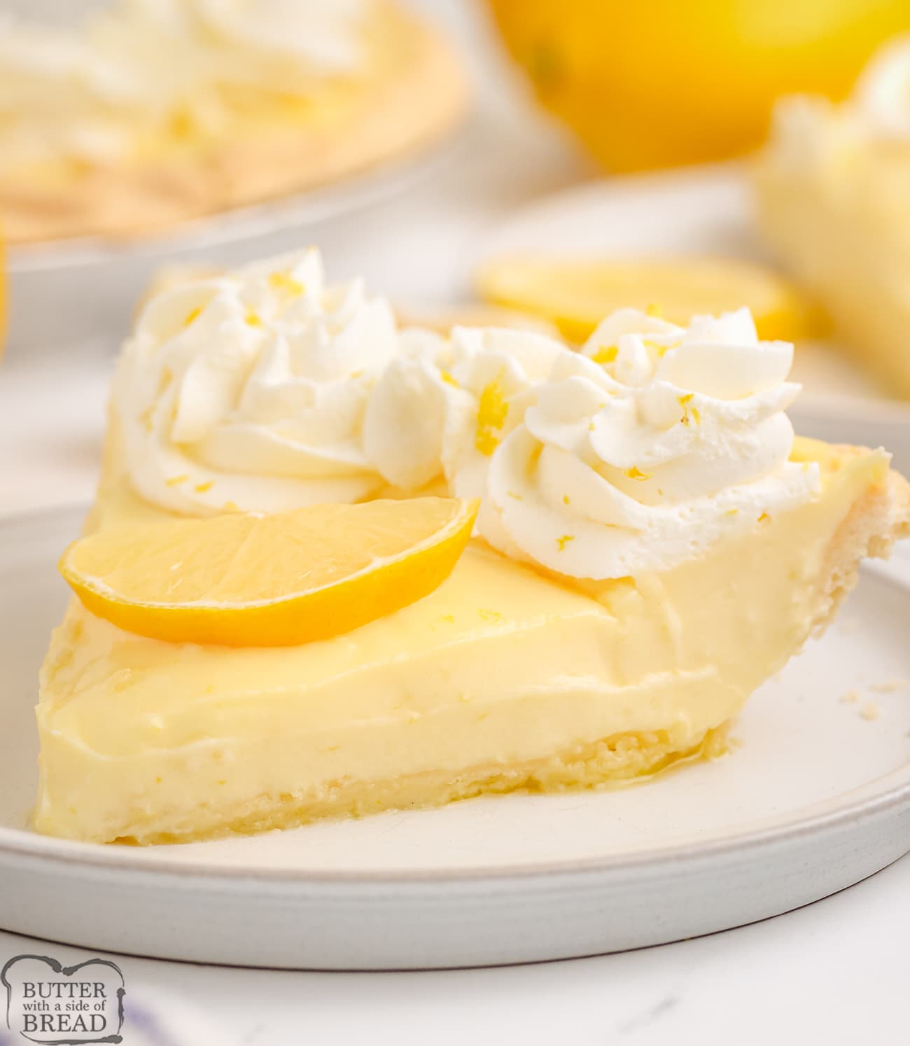 slice of lemon cream pie made with a lemon custard