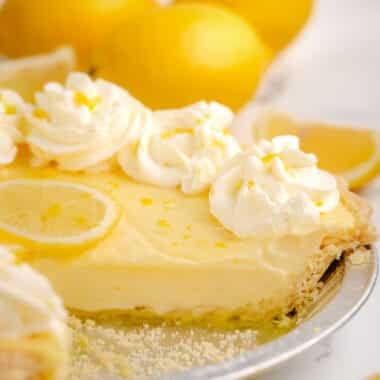 slice taken out of a homemade lemon cream pie