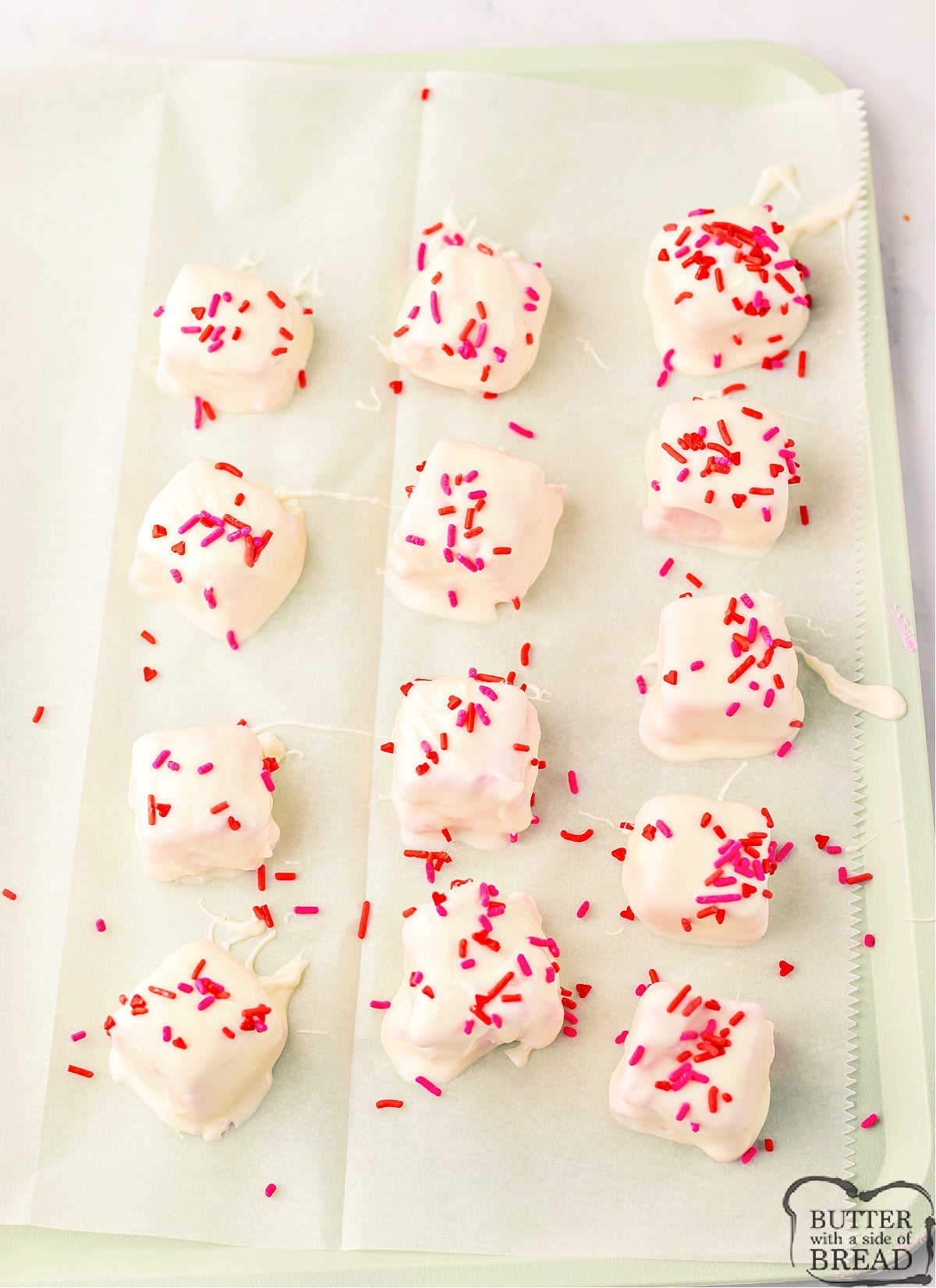 Dipped candy setting up on wax paper.