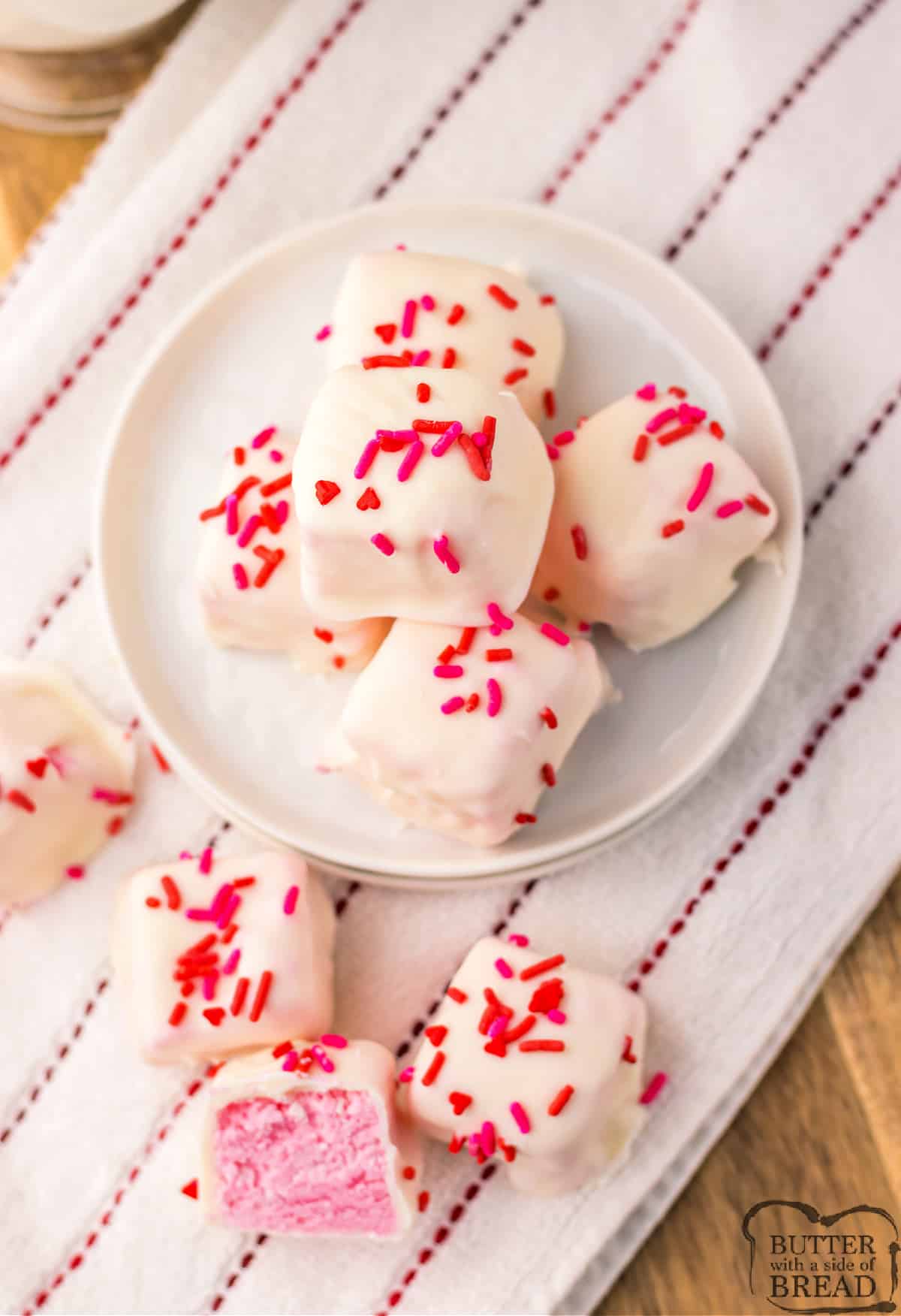 Strawberry Cool Whip Candy is made with only 3 ingredients and a microwave. Easy and delicious candy recipe that is perfect for Valentine's Day - or anytime you want something sweet!
