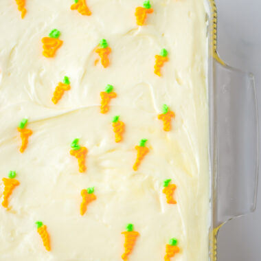 carrot cake poke cake baked in a sheet pan