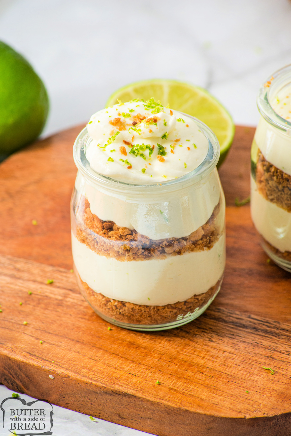 Key Lime Pie Cups are made with layers of coconut and cookies and sweet, creamy lime filling. These delicious dessert cups only take a few minutes to assemble, and taste just like key lime pie!