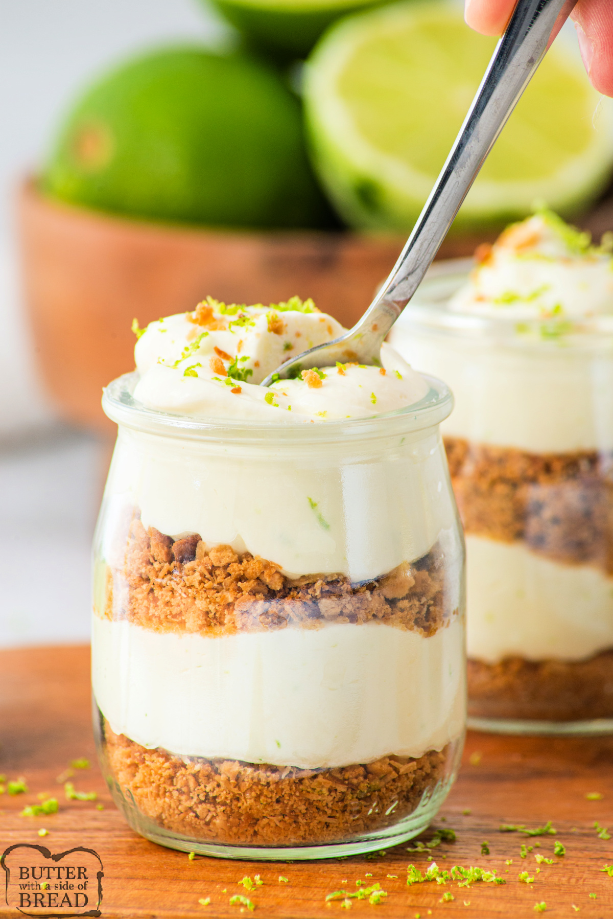 Spoonful of key lime pie filling with cookie crumbs.