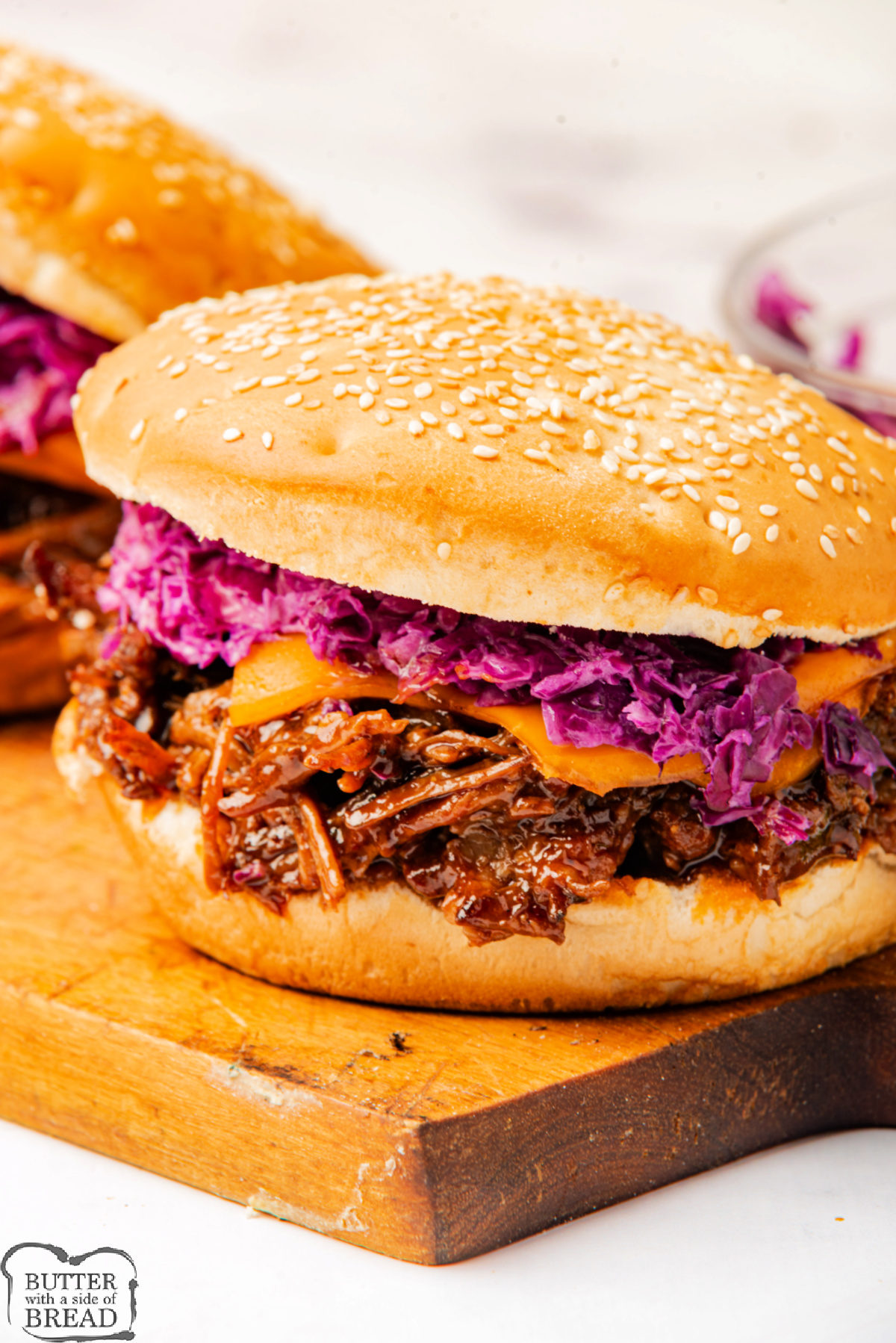 BBQ Brisket Sandwich with shredded red cabbage and cheese. 