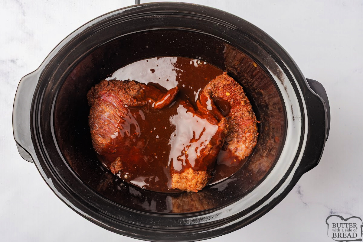 Pour sauce over brisket in the crockpot.