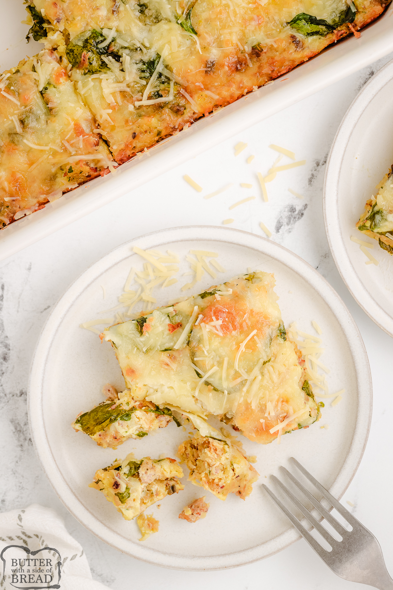 serving a portion of sausage stuffing casserole