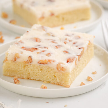 slice of Texas white sheet cake on a white plate
