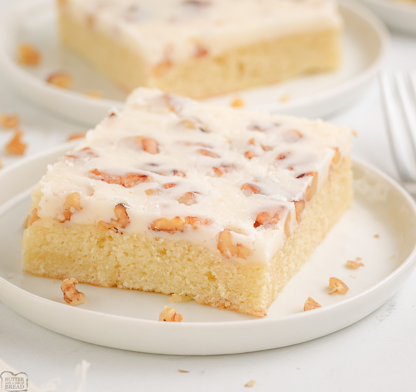 slice of Texas white sheet cake on a white plate