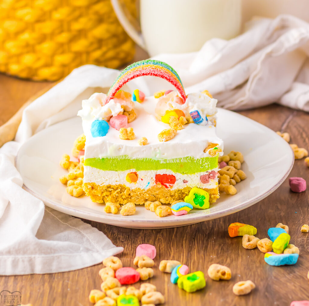 layered Lucky Charms dessert lush with a candy rainbow top