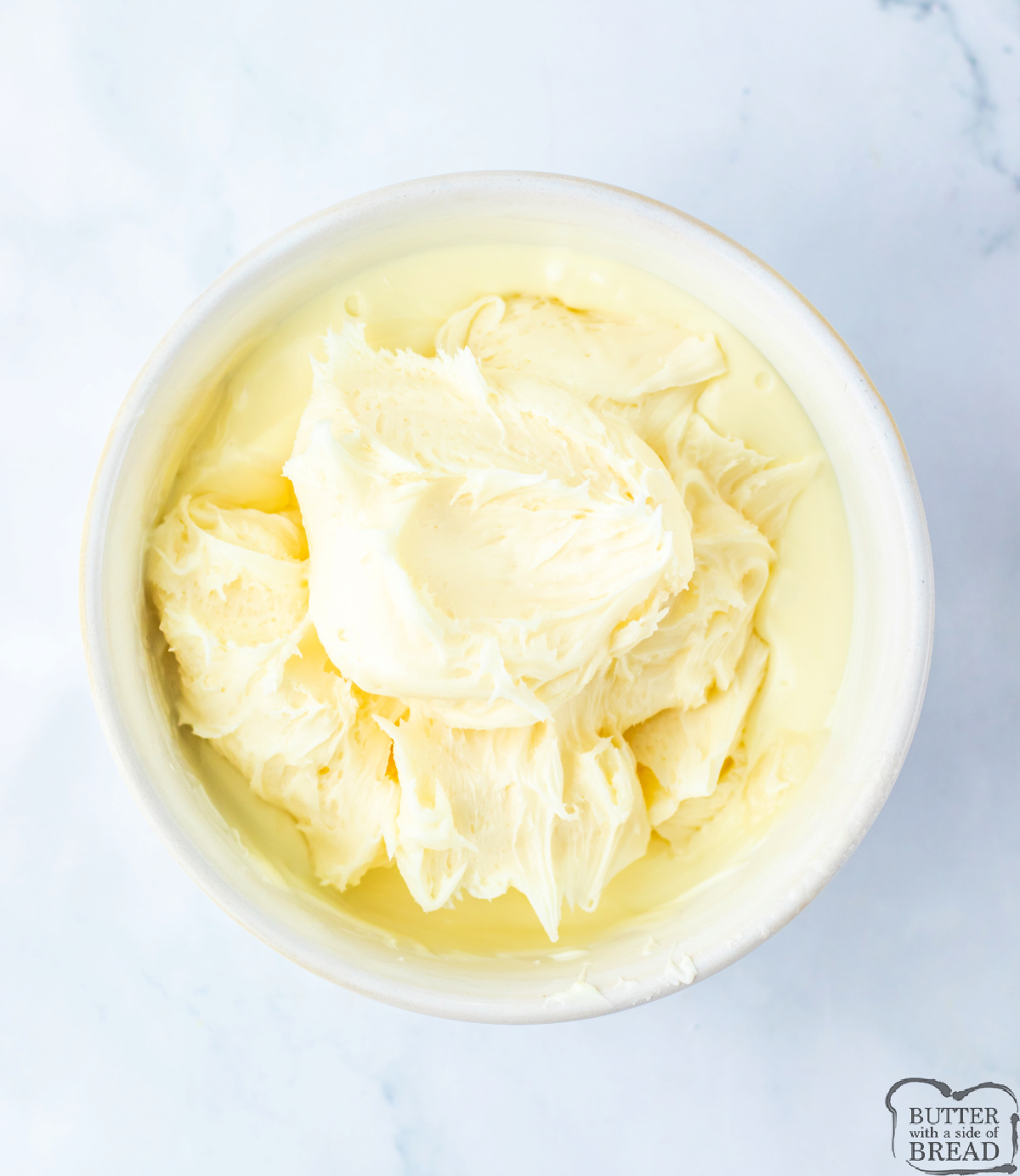 Mix vanilla frosting and melted white chocolate chips.