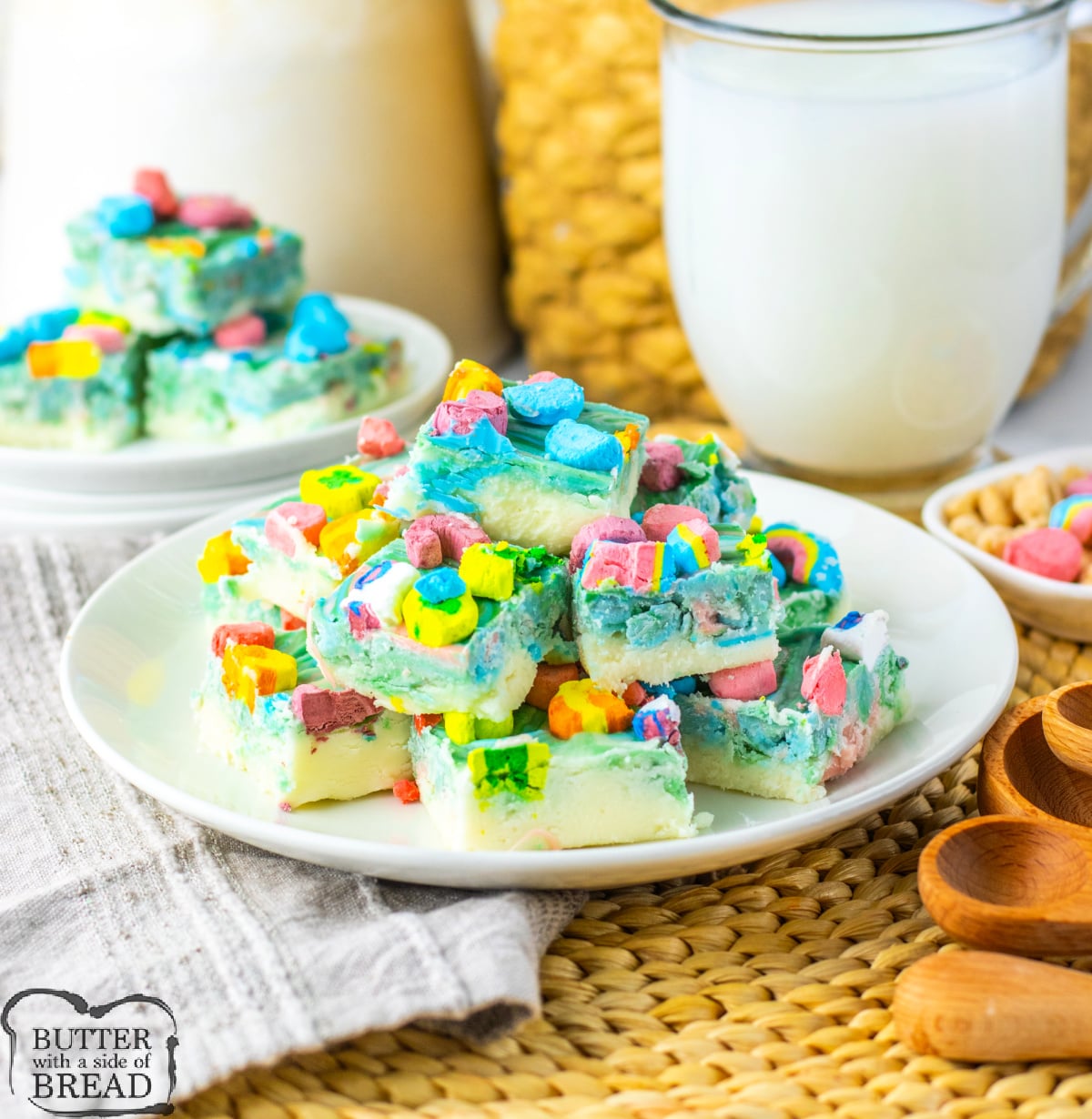 Lucky Charms Fudge is made with white chocolate chips, vanilla frosting, colored candy melts, and Lucky Charms marshmallows. This colorful fudge recipe requires only four ingredients and a microwave!