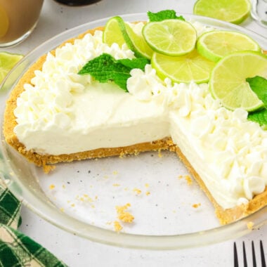 key lime pie with slices taken out