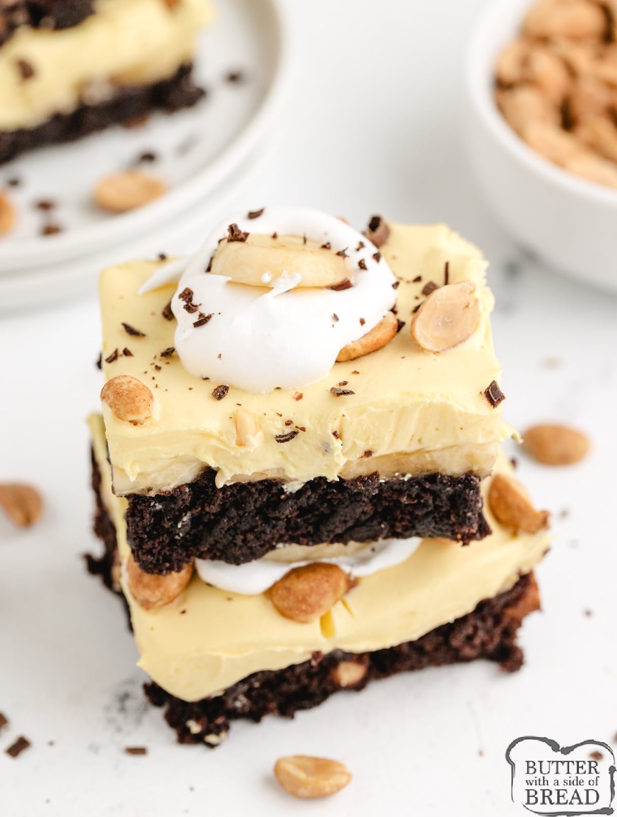 Banana Cream Brownies are made with a brownie mix, peanuts, sliced bananas, and a creamy vanilla pudding layer on top. You'll never eat regular brownies again!