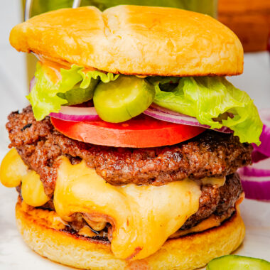 ½ pound homemade burger stuffed with American Cheese