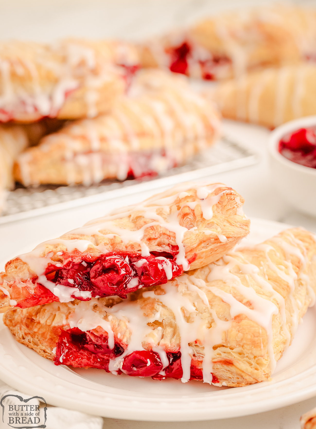 glazed puff pastry turnovers made with cherry pie filling