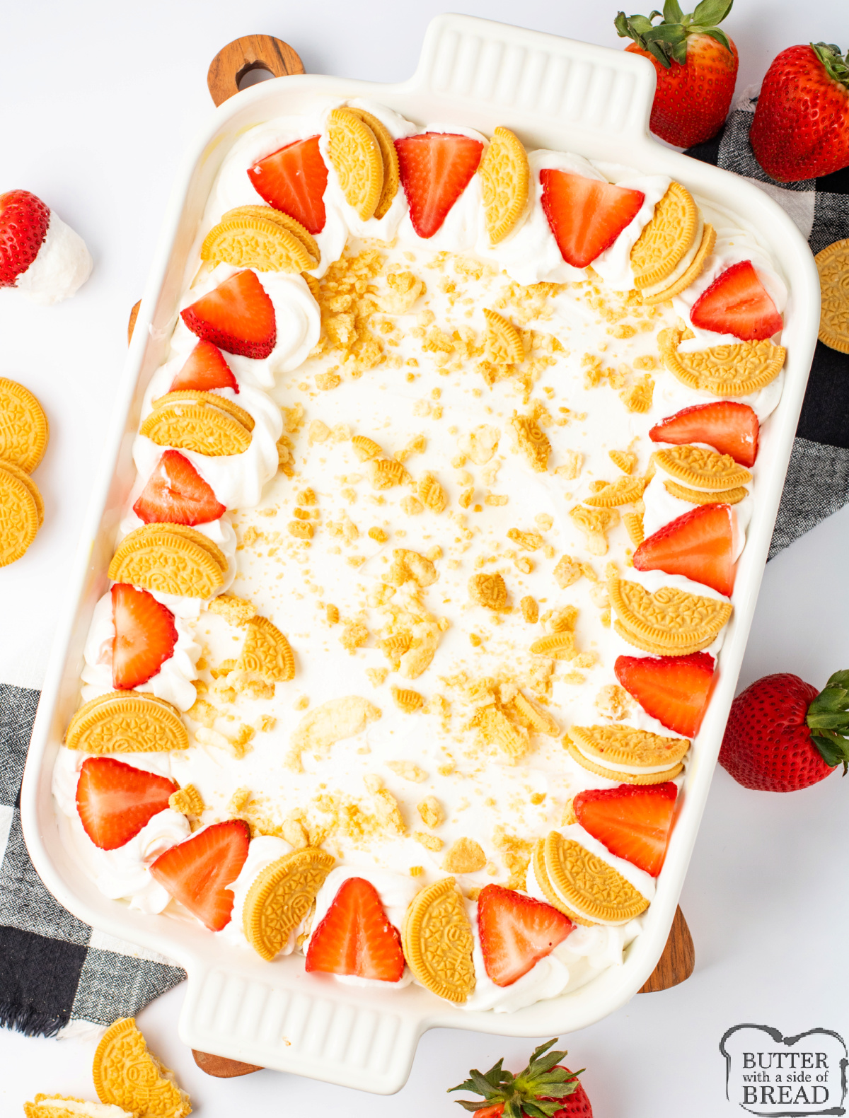Golden Oreo Strawberry Pudding Cake is a light, fruity dessert with fresh strawberries, pudding, and whipped topping.