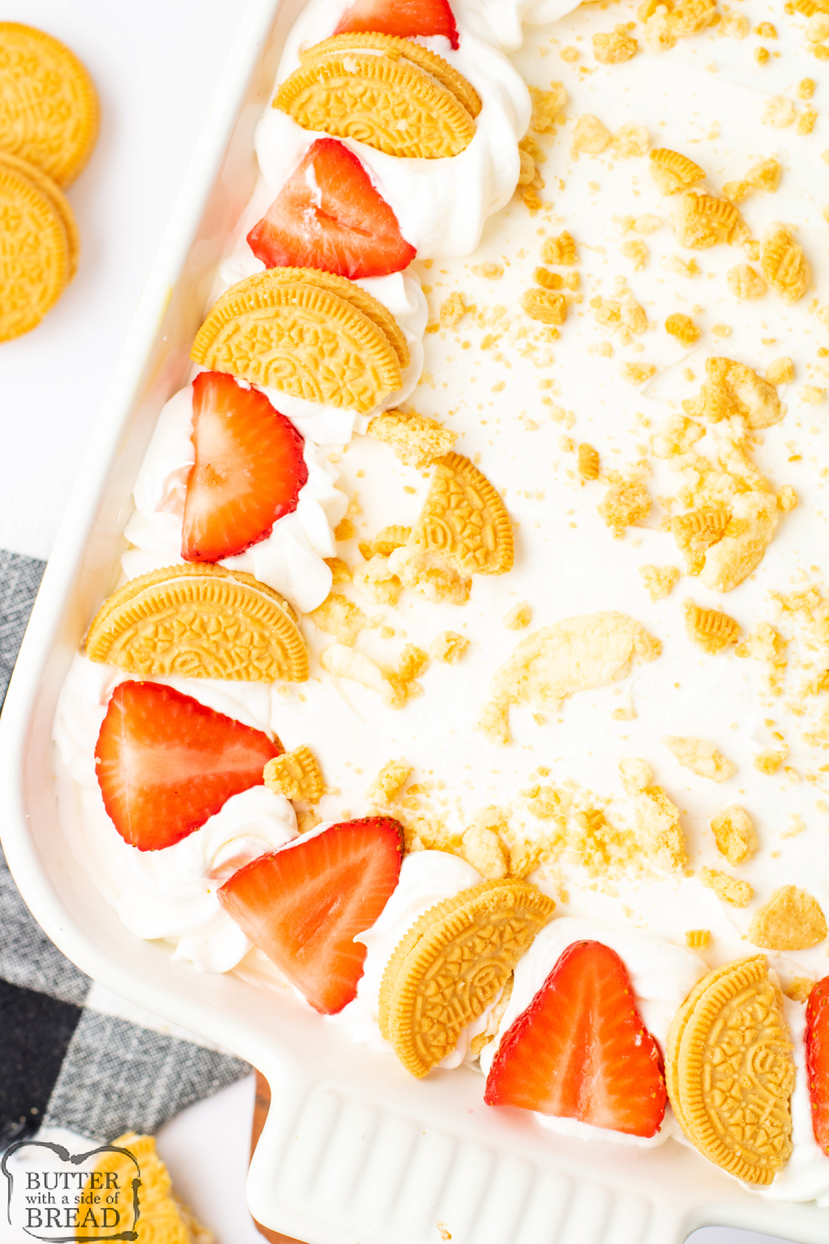 Golden Oreo Strawberry Pudding Cake is a light, fruity dessert with fresh strawberries, pudding, and whipped topping.