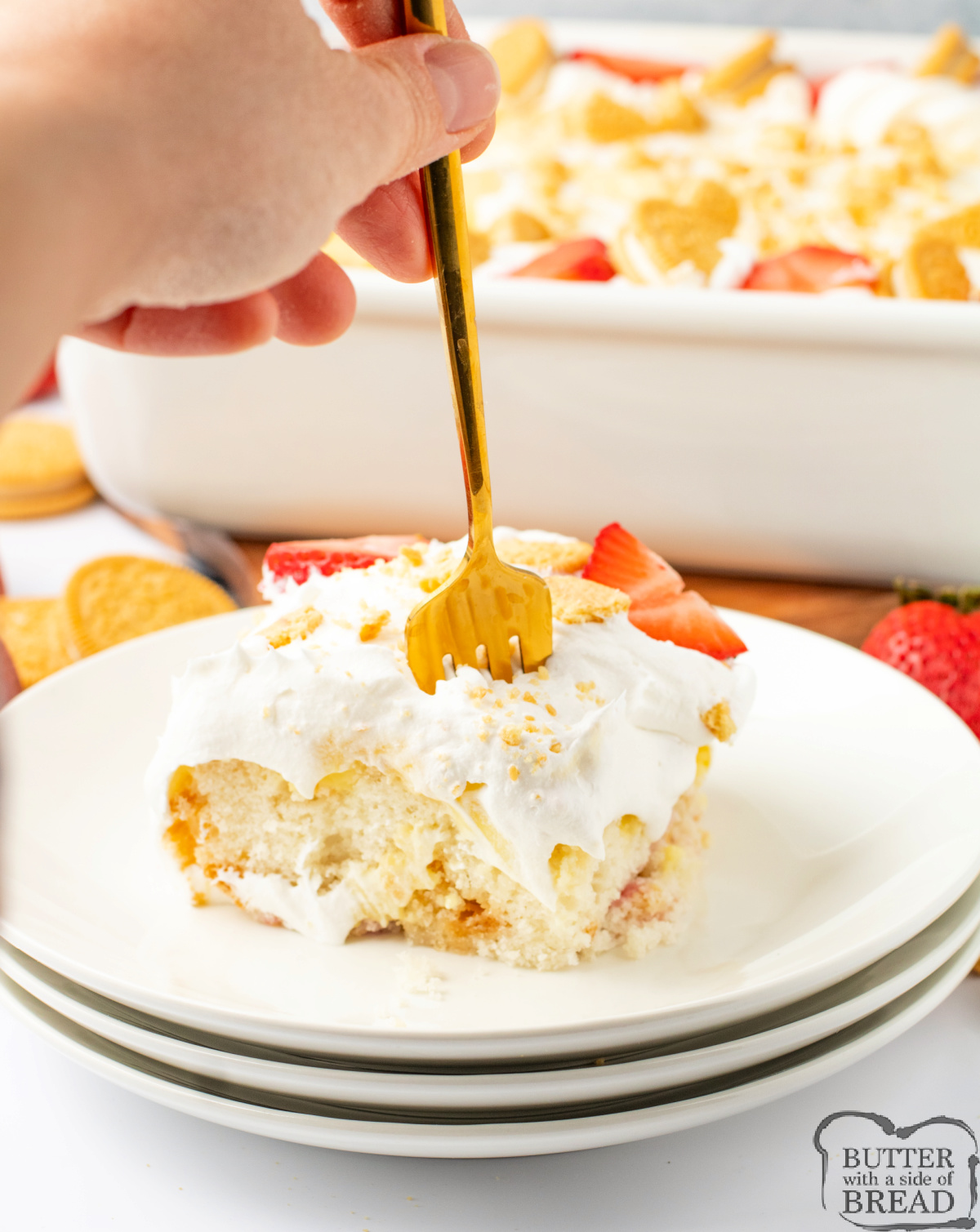 Golden Oreo Strawberry Pudding Cake is a light, fruity dessert with fresh strawberries, pudding, and whipped topping.