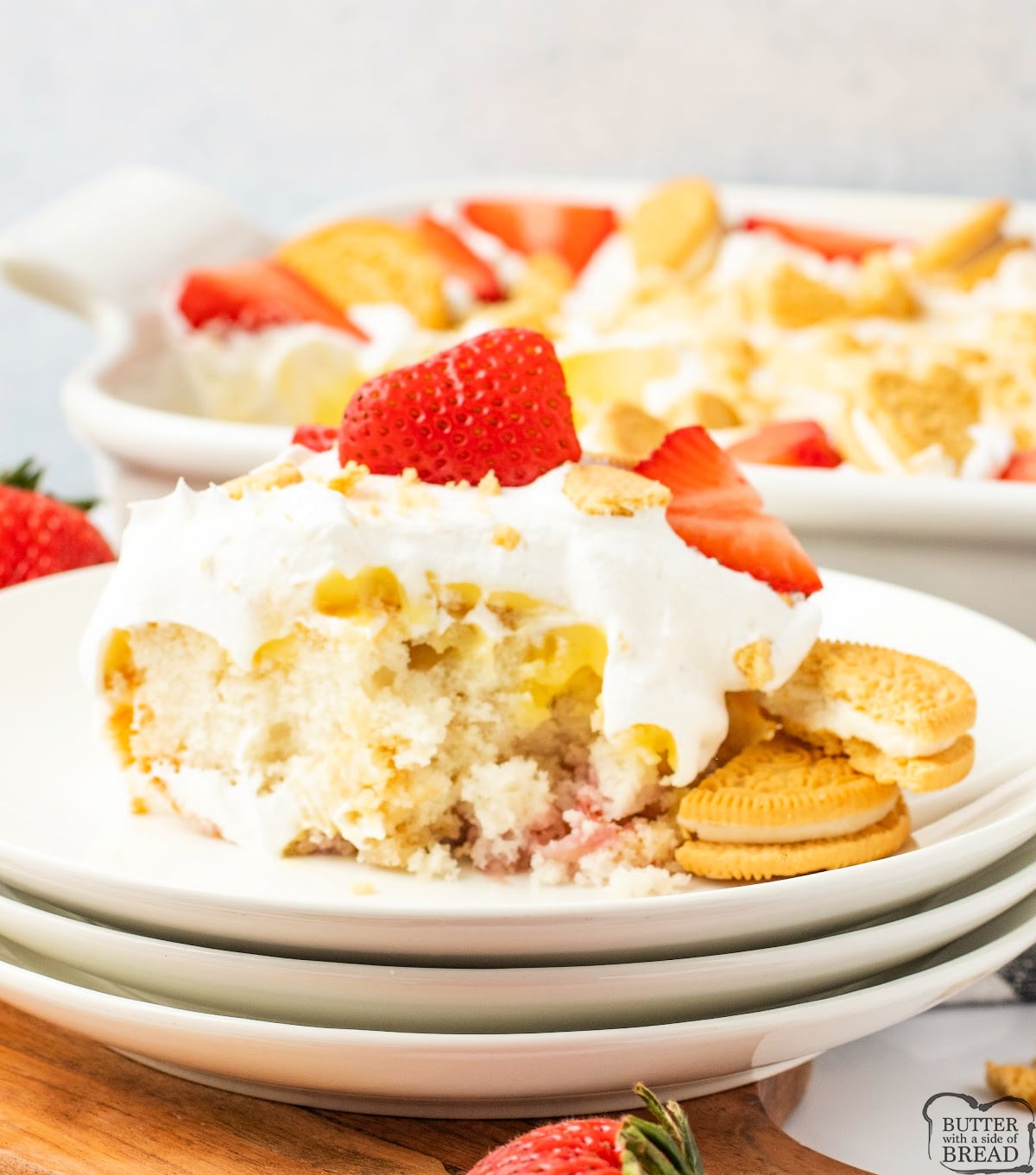 Golden Oreo Strawberry Pudding Cake is a light, fruity dessert with fresh strawberries, pudding, and whipped topping.