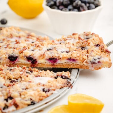 slice of lemon dessert pizza with blueberries