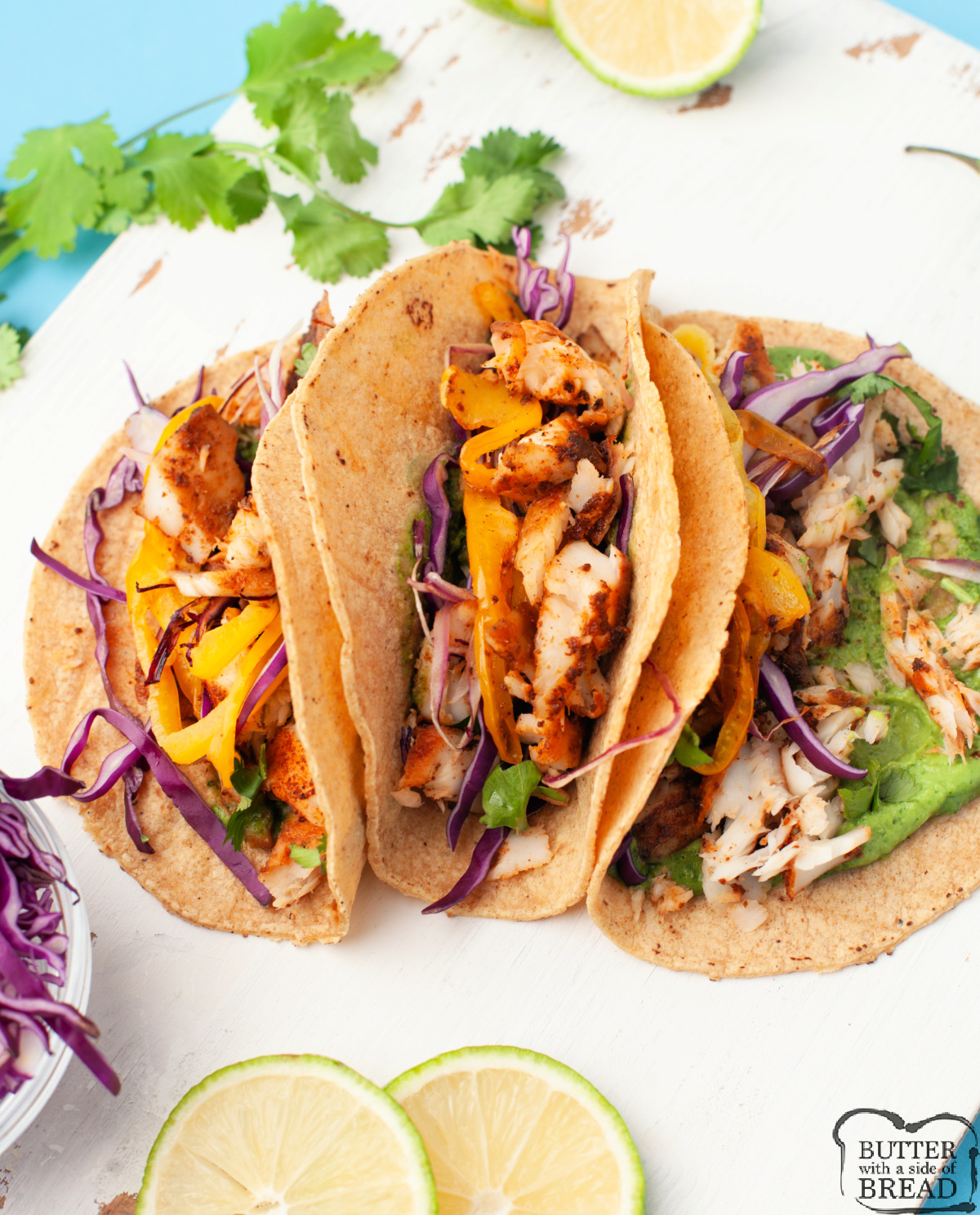 Sheet Pan Fish Tacos with Avocado Sauce combine spiced tilapia, roasted bell peppers and onions, and zesty homemade avocado sauce for the ultimate one-pan dinner. With just a few fresh ingredients and bold seasoning, these tacos are quick, flavorful, and satisfying.