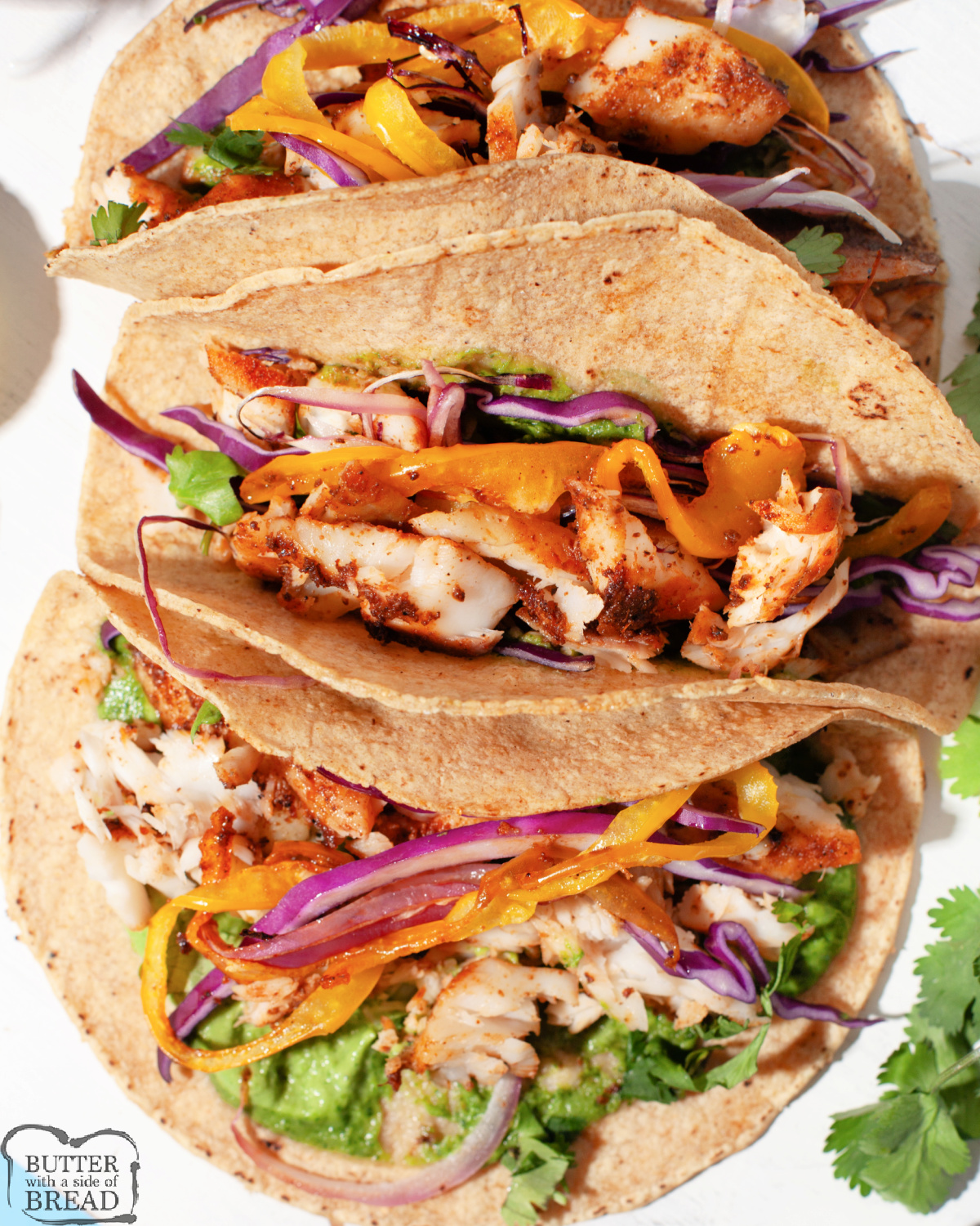 Sheet Pan Fish Tacos with Avocado Sauce combine spiced tilapia, roasted bell peppers and onions, and zesty homemade avocado sauce for the ultimate one-pan dinner. With just a few fresh ingredients and bold seasoning, these tacos are quick, flavorful, and satisfying.