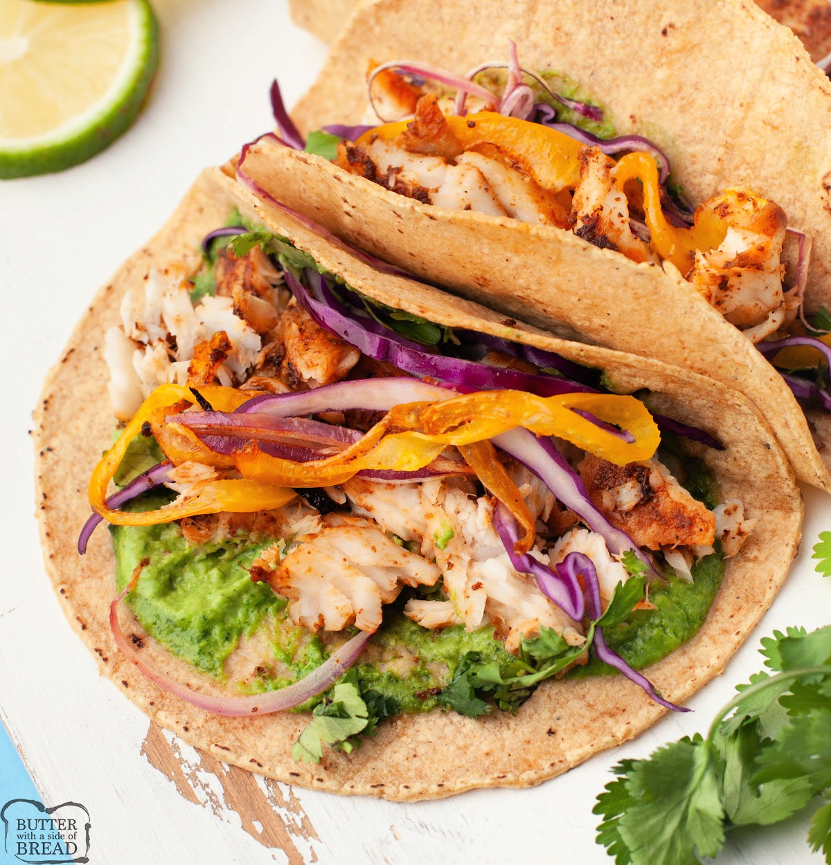 Sheet Pan Fish Tacos with Avocado Sauce combine spiced tilapia, roasted bell peppers and onions, and zesty homemade avocado sauce for the ultimate one-pan dinner. With just a few fresh ingredients and bold seasoning, these tacos are quick, flavorful, and satisfying.