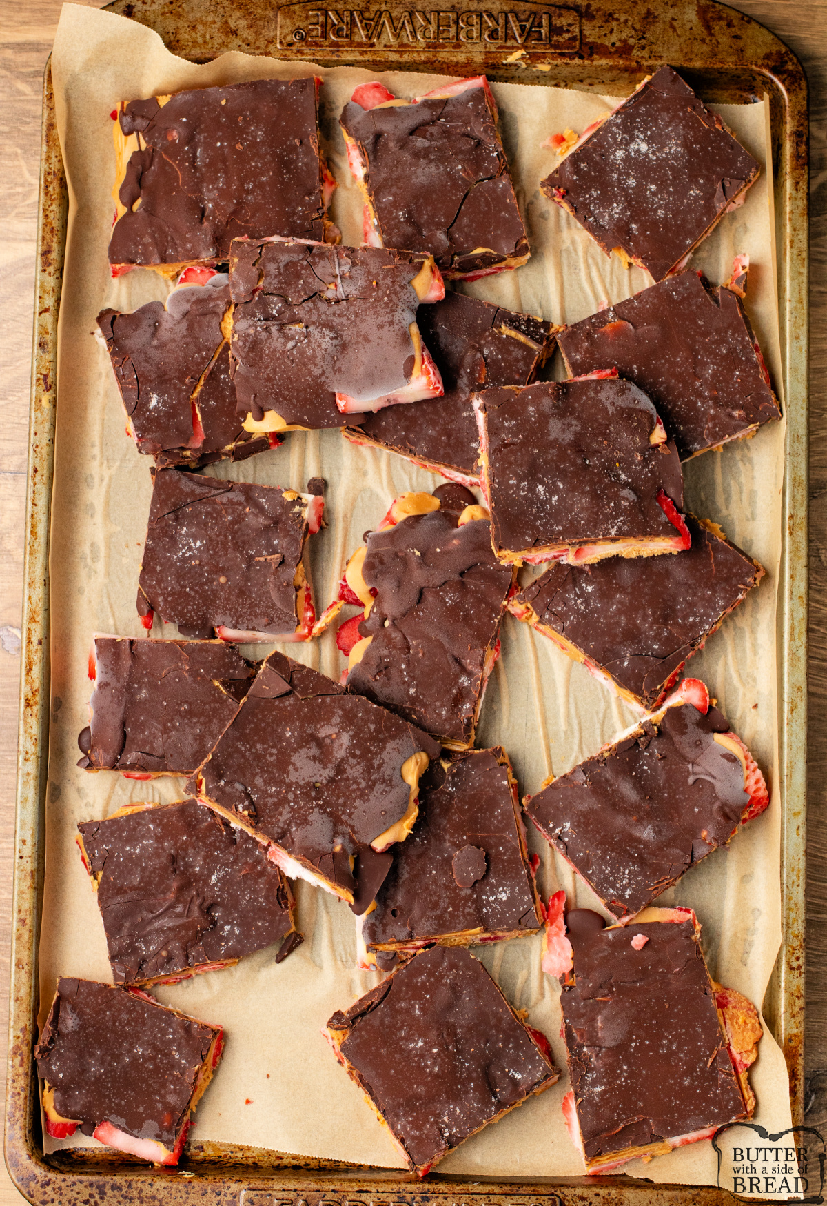 Bark made with chocolate, peanut butter, and strawberries.