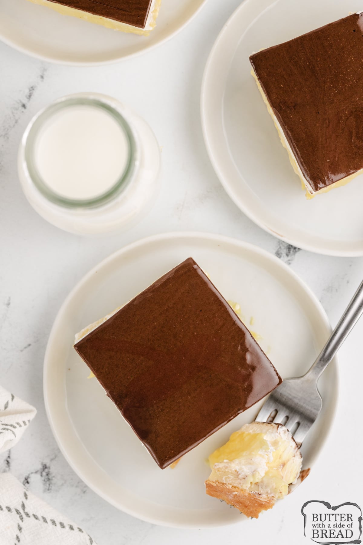Servings of layered eclair dessert.
