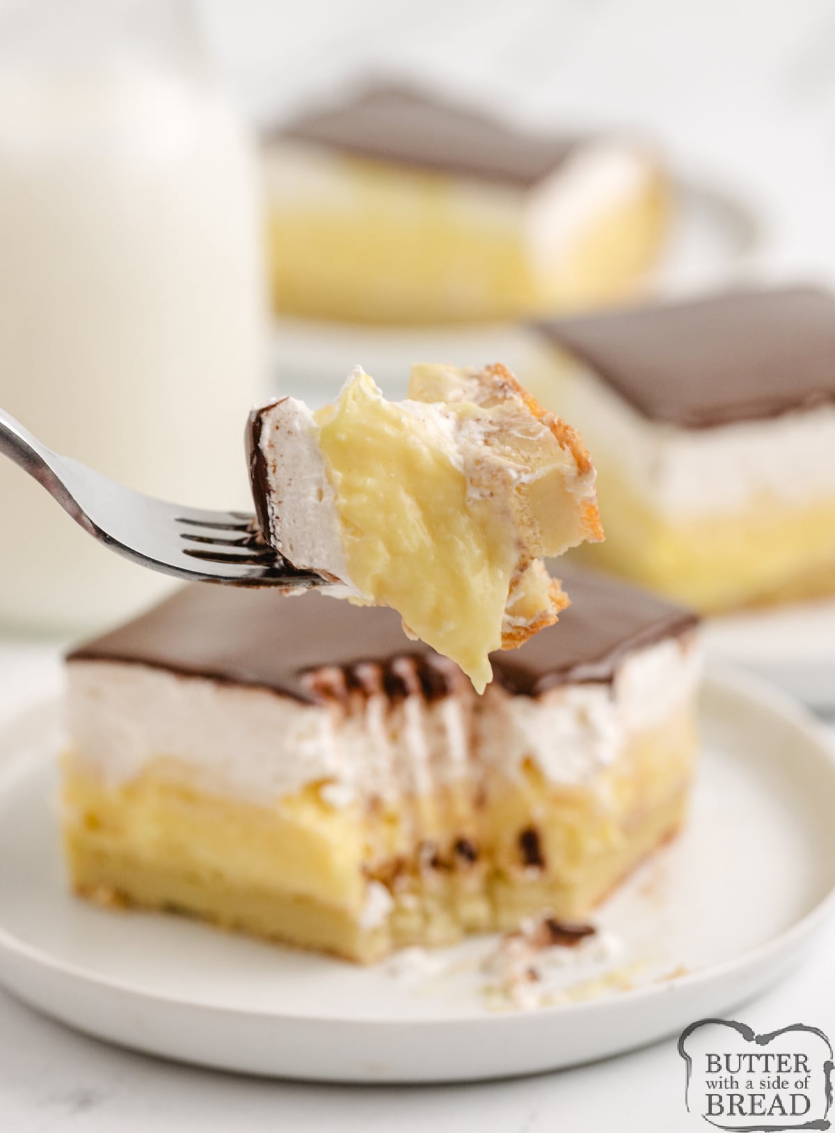Forkful of eclair dessert. 