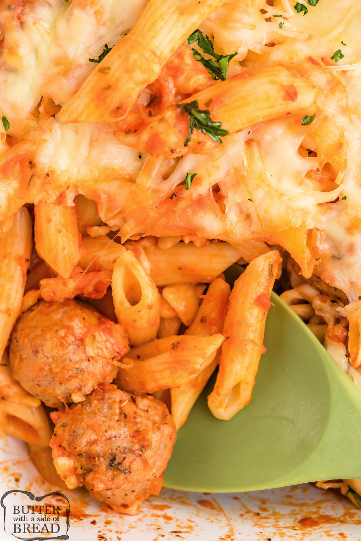 Casserole made with pasta, meatballs, and cheese.