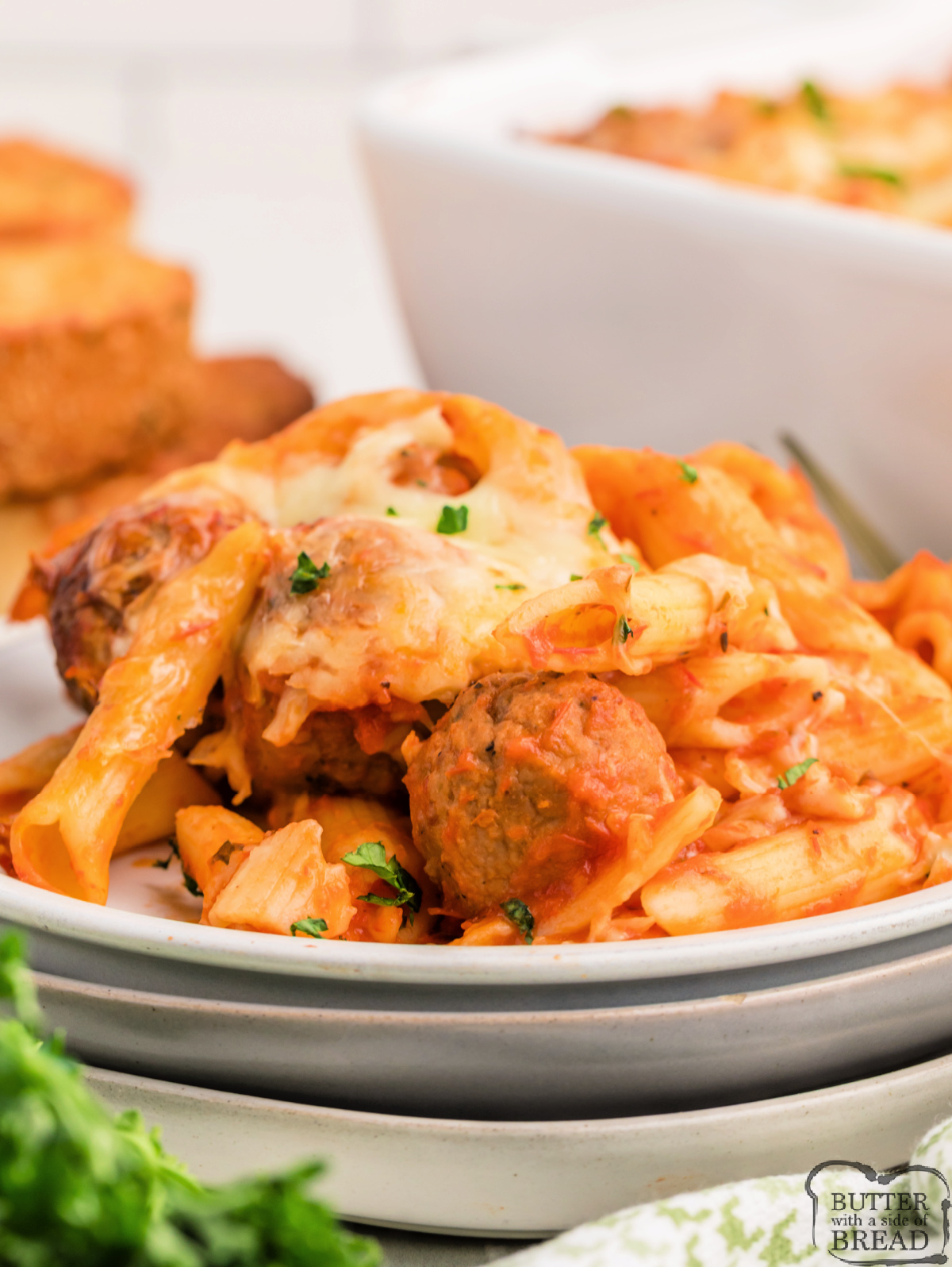 Cheesy Meatball Pasta Bake made with penne, marinara, and frozen meatballs—an easy, hearty dinner the whole family will love.