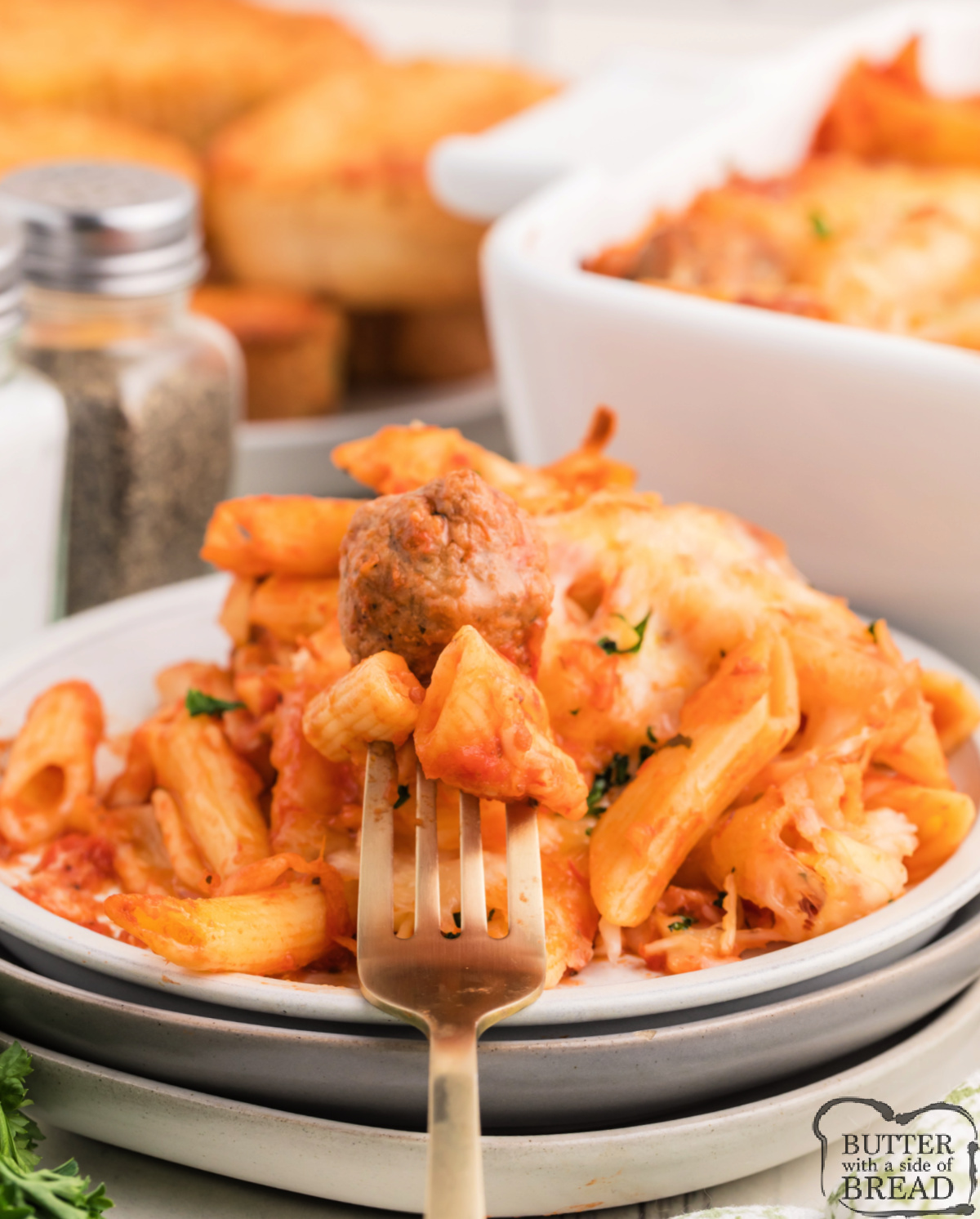 Casserole made with meatballs and penne pasta.