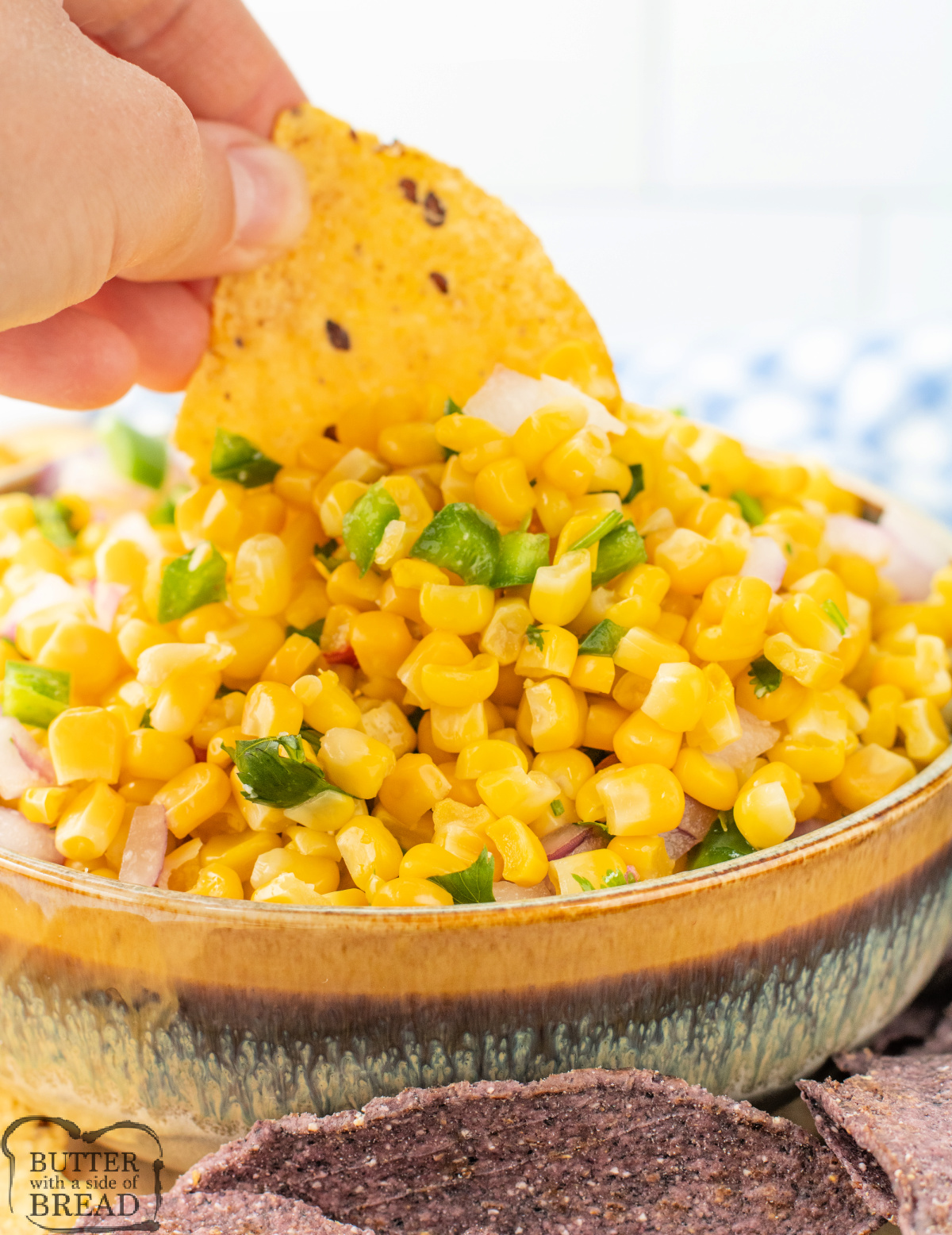 Chipotle Corn Salsa is a zesty mix of corn, jalapeño, red onion, lime, and cilantro—perfect for chips, tacos, or grilled meats!