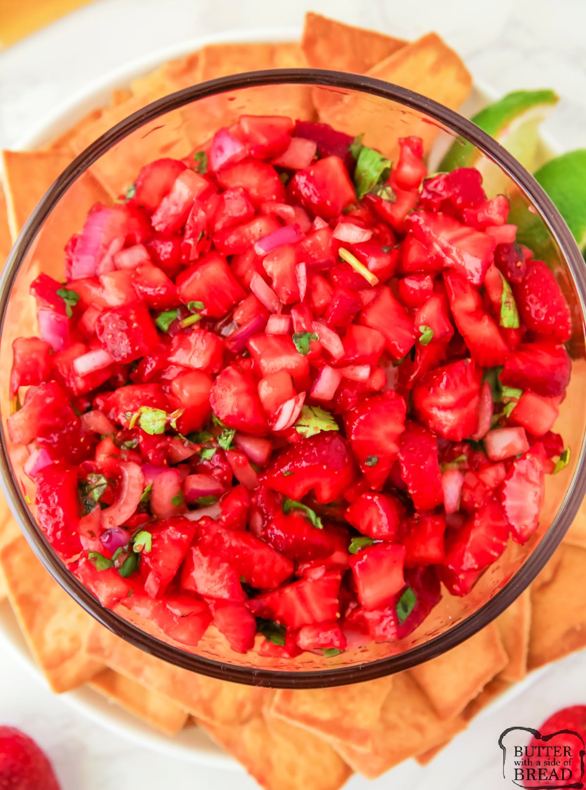 Salsa made with strawberries, red onions, and cilantro.