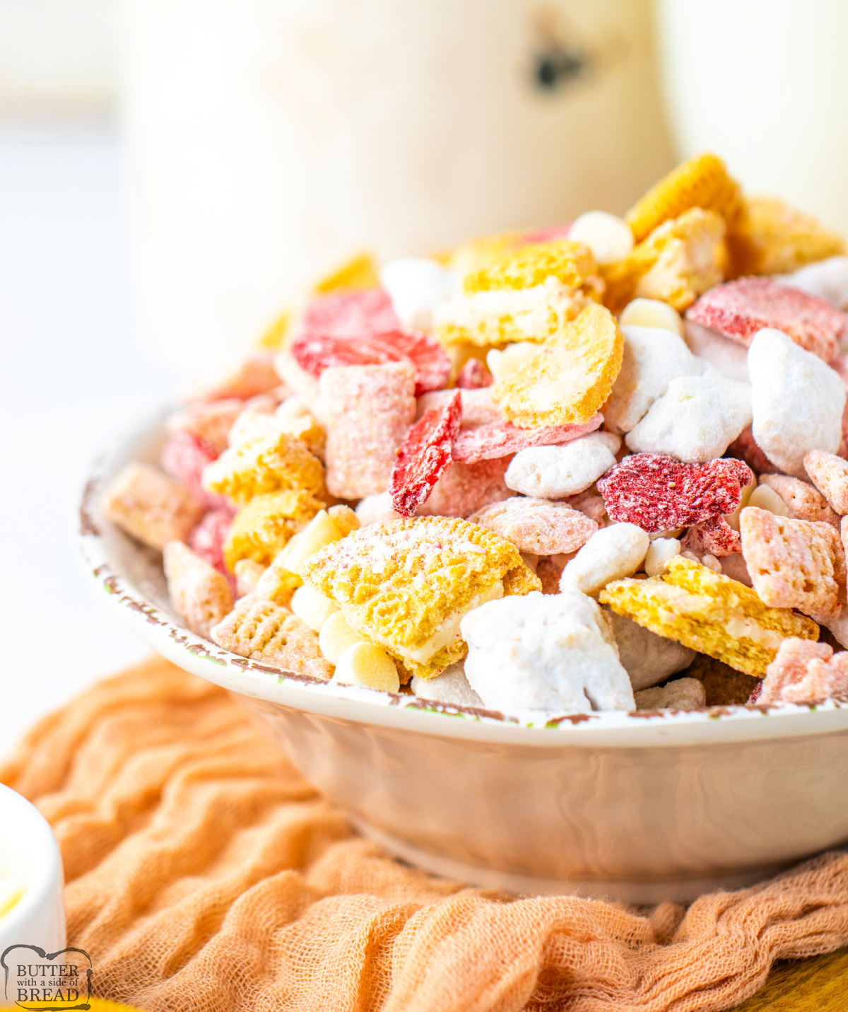 Strawberry Shortcake Muddy Buddies are a sweet, crunchy snack mix with Chex, strawberry melts, Oreos, and powdered sugar—ready in 10 mins!