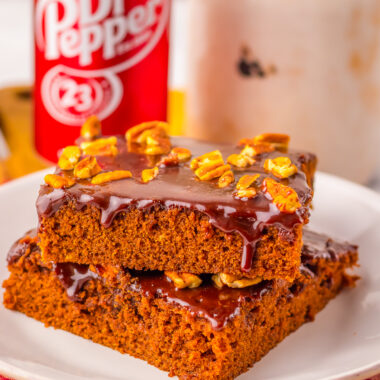 sliced of Dr Pepper chocolate sheet cake with a can in the back