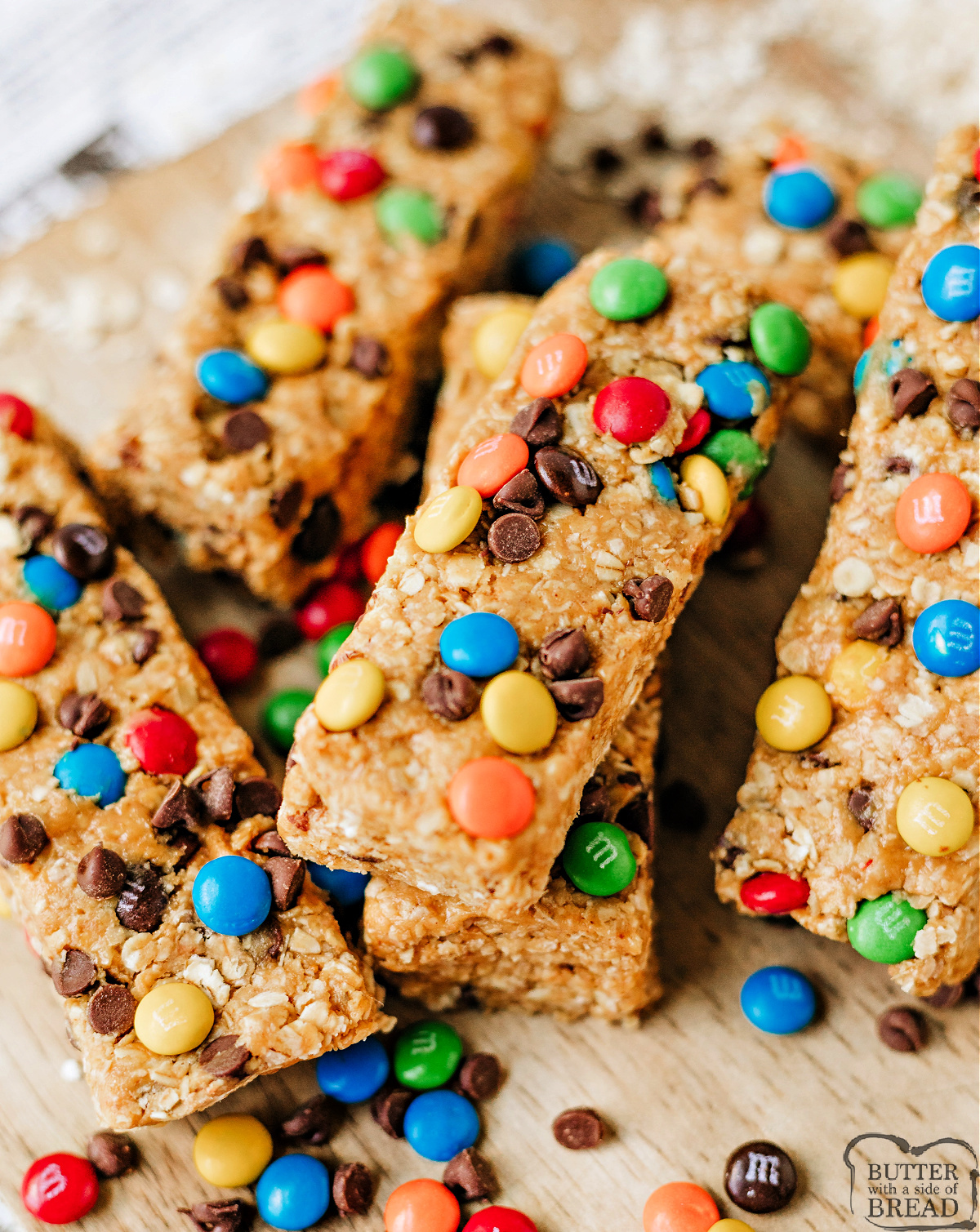 No-Bake Monster Cookie Granola Bars made with oats, peanut butter, honey, chocolate chips, and M&Ms. Easy, chewy, and delicious!