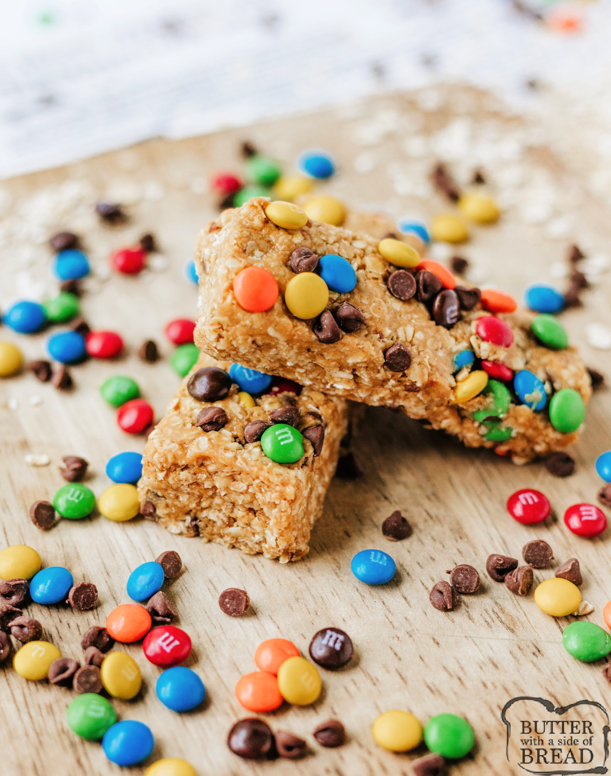 No-Bake Monster Cookie Granola Bars made with oats, peanut butter, honey, chocolate chips, and M&Ms. Easy, chewy, and delicious!